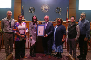 Ed Spainhower was joined by Employee Relations Specialist Lincoln McDonald, Employee Relations Manager Troshaunda Elie, Human Resources Director Nikki Powell, Deputy Human Resources Director Janice Floyd, HRIS-Personnel Clerk Jon Lachney, and Risk Manager Mark Bartlett for his Employee of the Year proclamation.