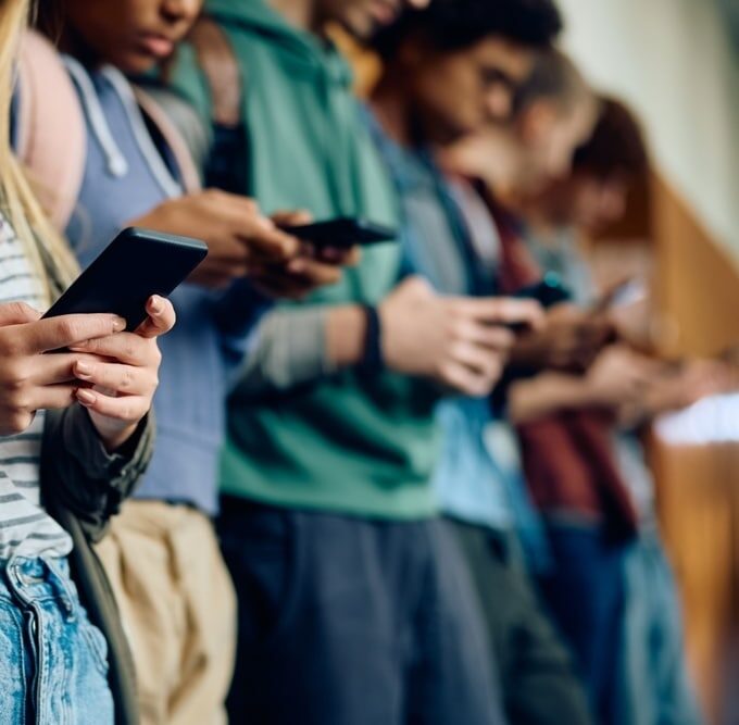 Closeupofteenagegirlandherfriendsusingmobile - Rick's Blog