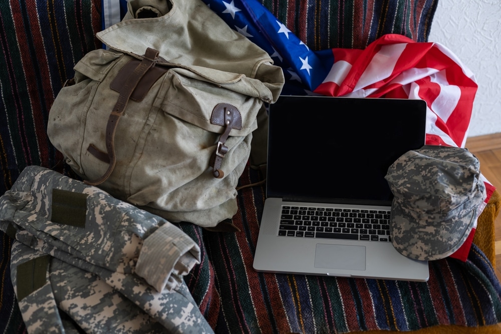 Backpackandlaptopagainstamericanflagmilitaryeducation - Rick's Blog