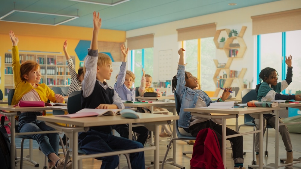 Elementary,classroom,with,diverse,children,listening,to,the,teacher,asking - Rick's Blog