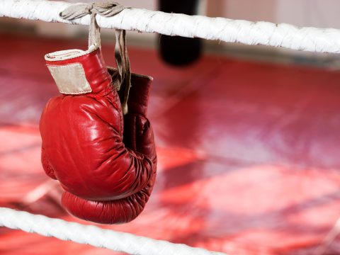 Closeupofboxingglovesontheropesofa - Rick's Blog