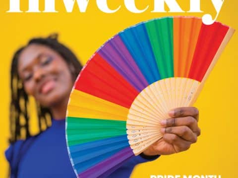 Inweekly magazine cover: smiling person in a blue shirt holds a rainbow fan against a bright yellow background; text reads 'PRIDE MONTH TO-DOS'.