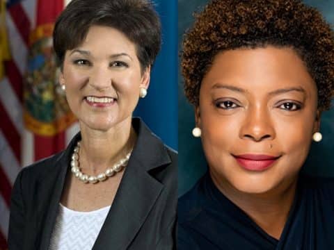 Two professional headshots side by side: left is a smiling white woman with short dark hair, pearl necklace, blazer; right is a smiling Black woman with short curly hair, pearl earrings, dark top.