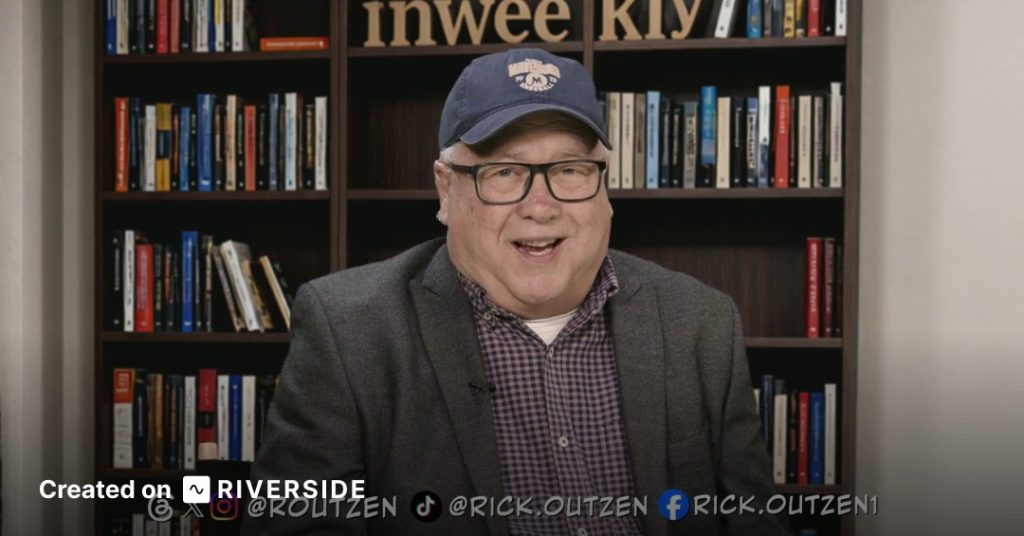 Smiling man in a blazer and cap speaks to the camera in front of a bookshelf backdrop; Riverside branding appears at the bottom left.